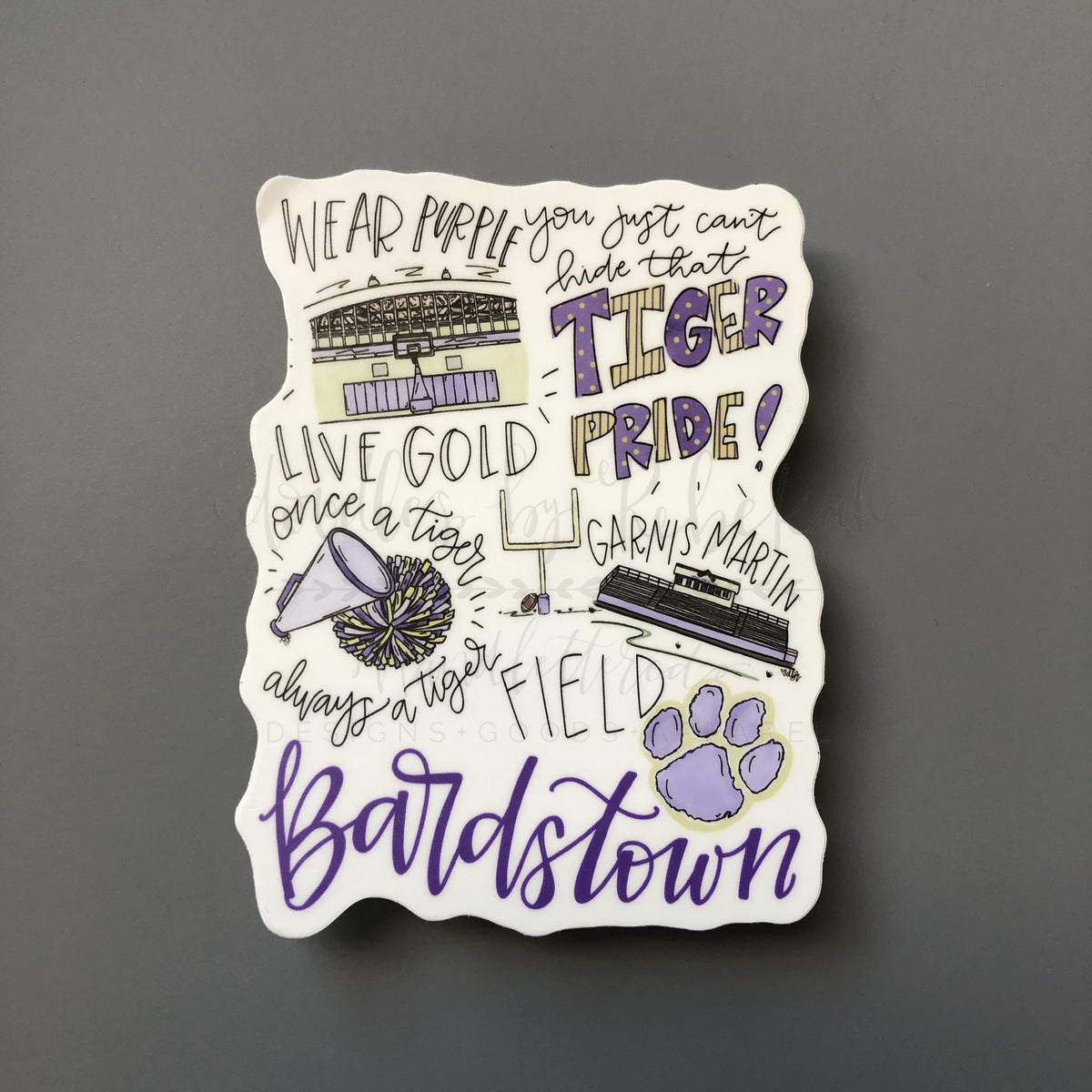 White sticker with purple and yellow design for Bardstown Tigers