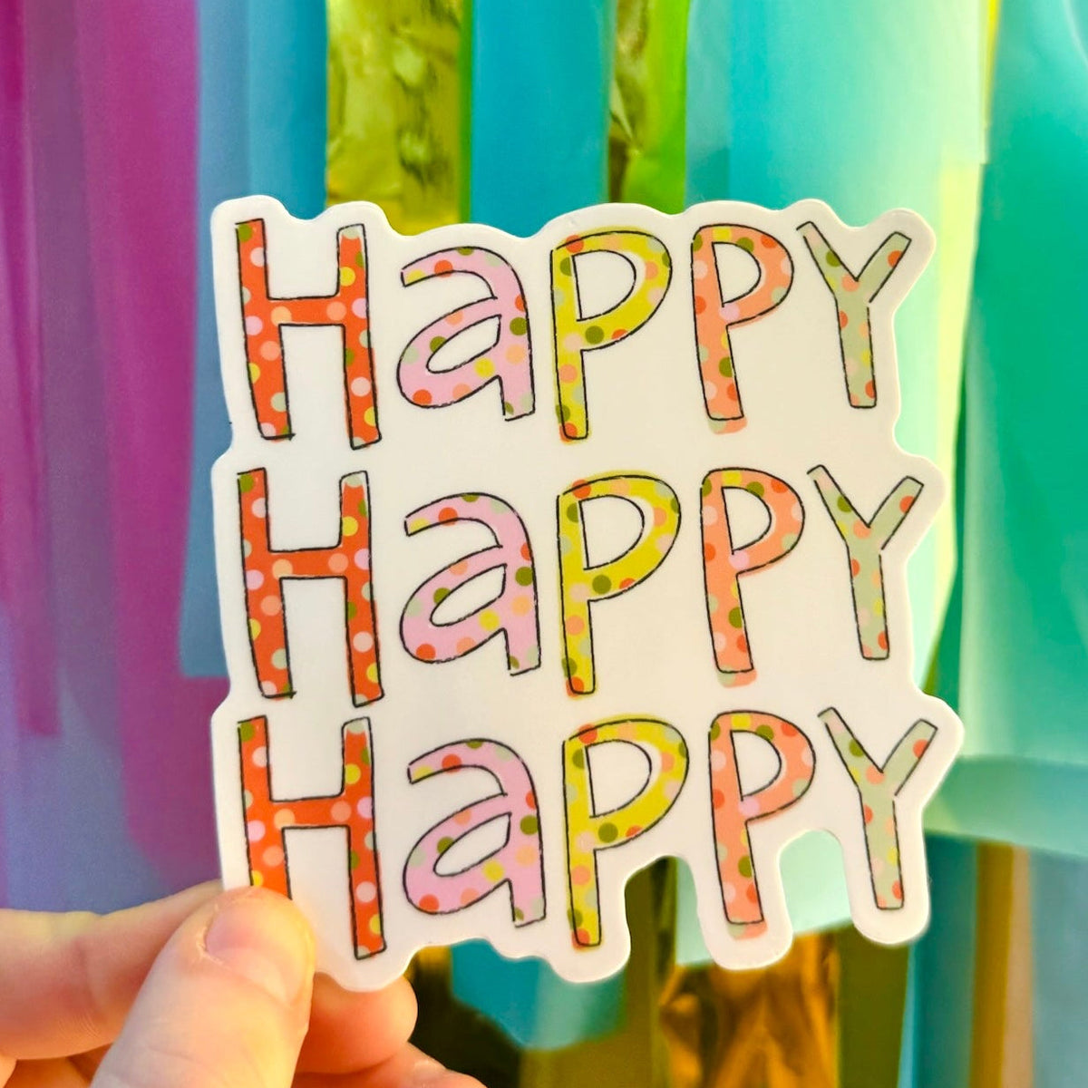 Doodles by Rebekah "Happy Happy Happy" whimsical patterned vinyl sticker. This colorful, multi-patterned lettering decal is an uplifting gift for decorating water bottles, laptops, and journals.