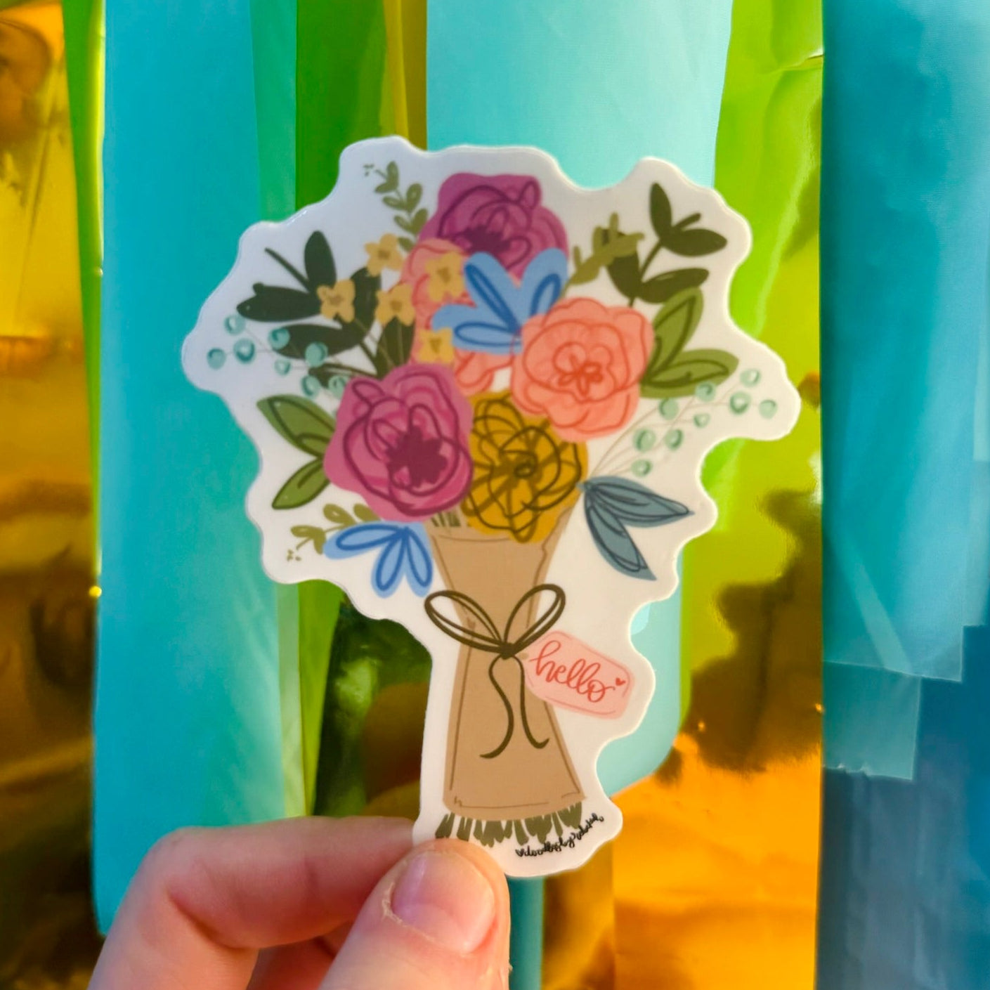 Doodles by Rebekah "Hello" floral bouquet vinyl sticker. This whimsical hand-painted flower decal is a perfect gift for friends or for decorating journals, water bottles, and laptops.