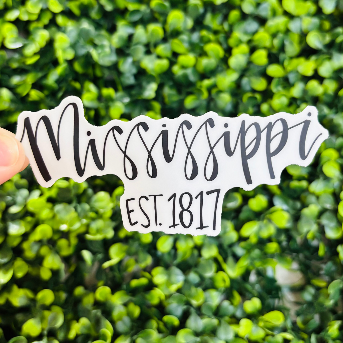 A black and white sticker that reads "Mississippi Est. 1817"