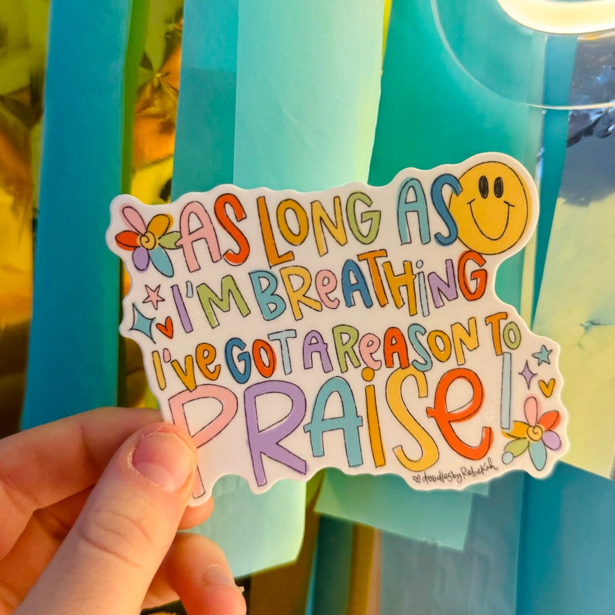 Doodles by Rebekah "Reason to Praise" inspirational vinyl sticker. This whimsical hand-painted religious quote decal is a perfect gift for faith-based decorating on water bottles, journals, and planners.