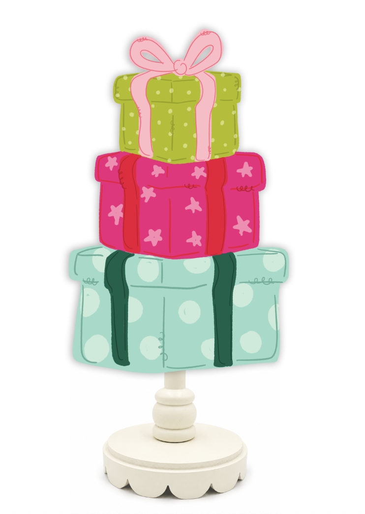 Decorative stand with stacked gift boxes in green, pink, and blue on a white background