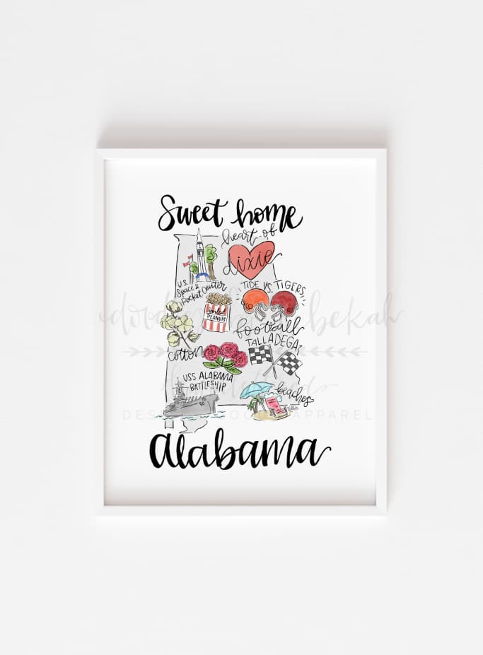white background with a framed print in the middle that says "Sweet Home Alabama"