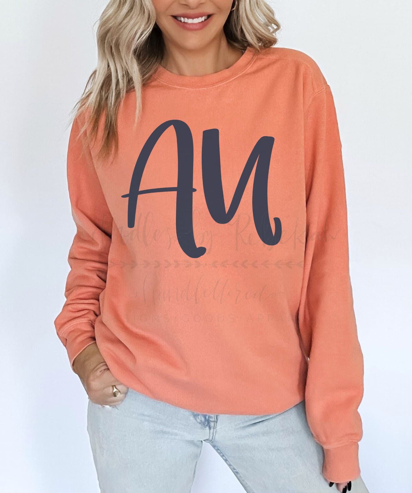 An orange unisex sweatshirt with a large blue letter 'A' on the front, representing the brand AU.