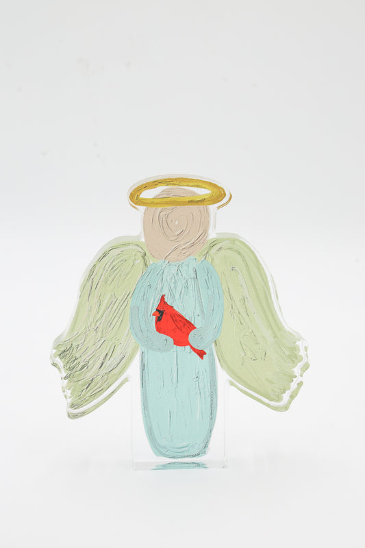 Angel figurine with a red cardinal on a white background