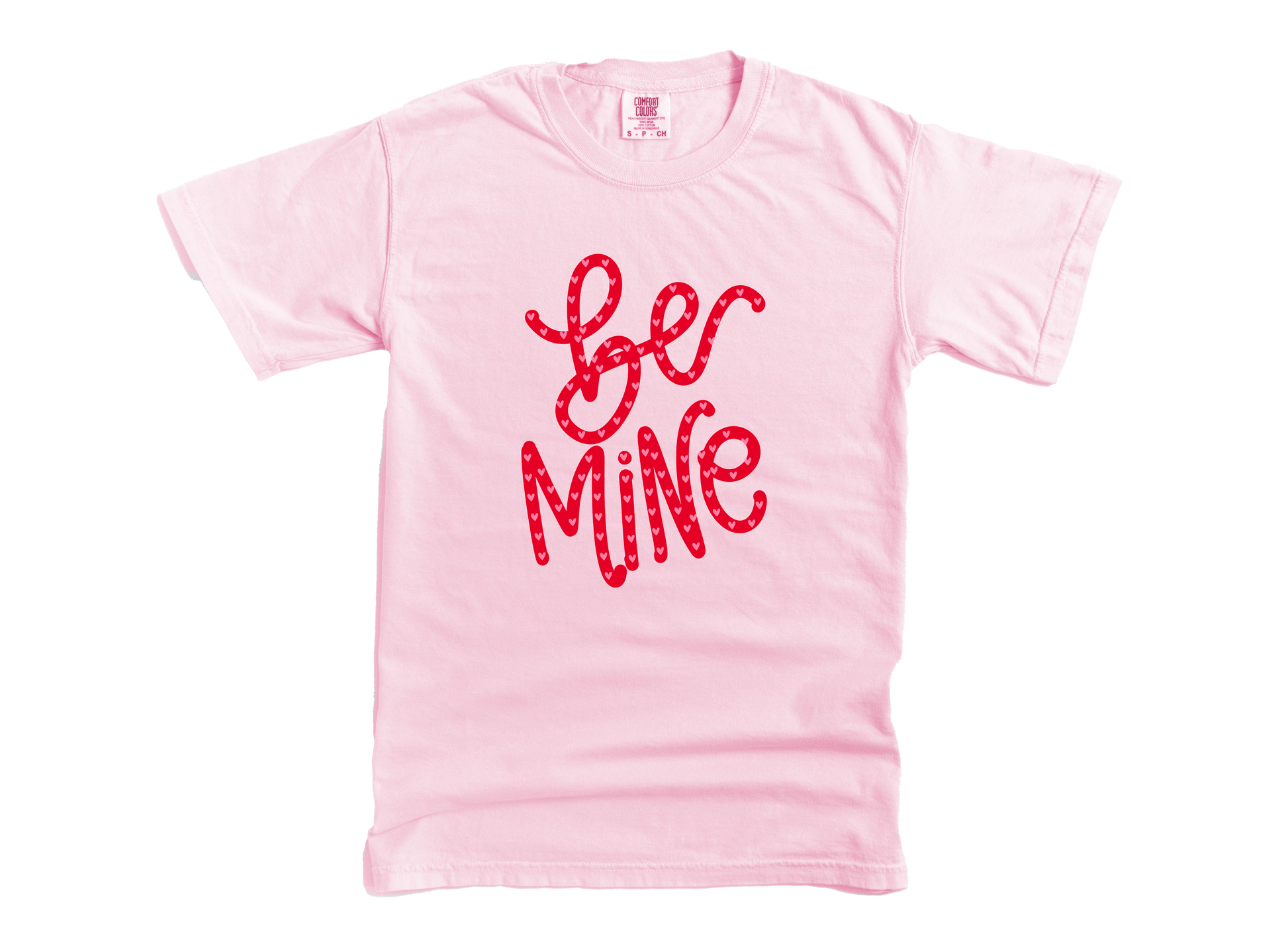 Pink t-shirt with 'Be Mine' text in red on a white background