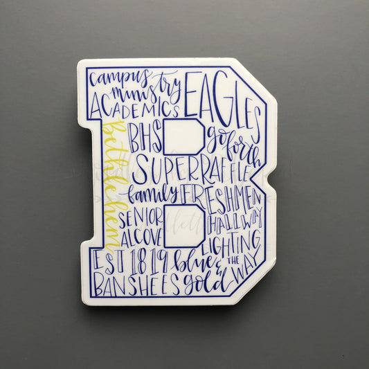 Bethlehem High School typography sticker in a block "B" shape featuring blue and gold school spirit words, perfect for student laptops or water bottles.