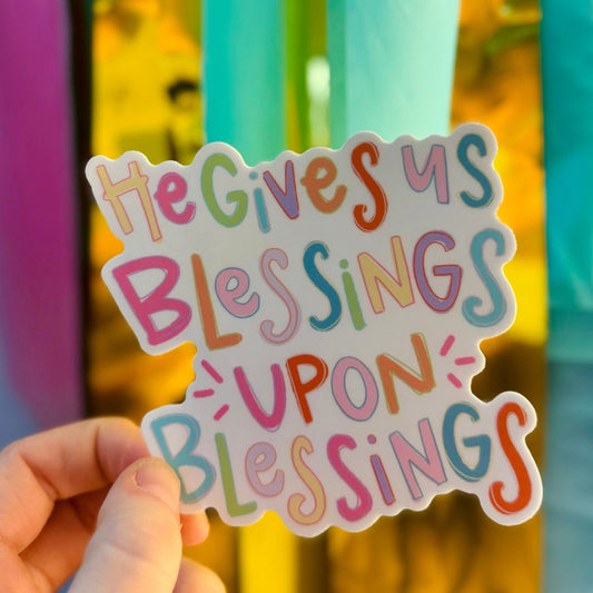 Doodles by Rebekah "Blessings Upon Blessings" inspirational faith sticker. This colorful hand-painted Christian vinyl decal is a perfect motivational gift for decorating Bibles, prayer journals, and water bottles.