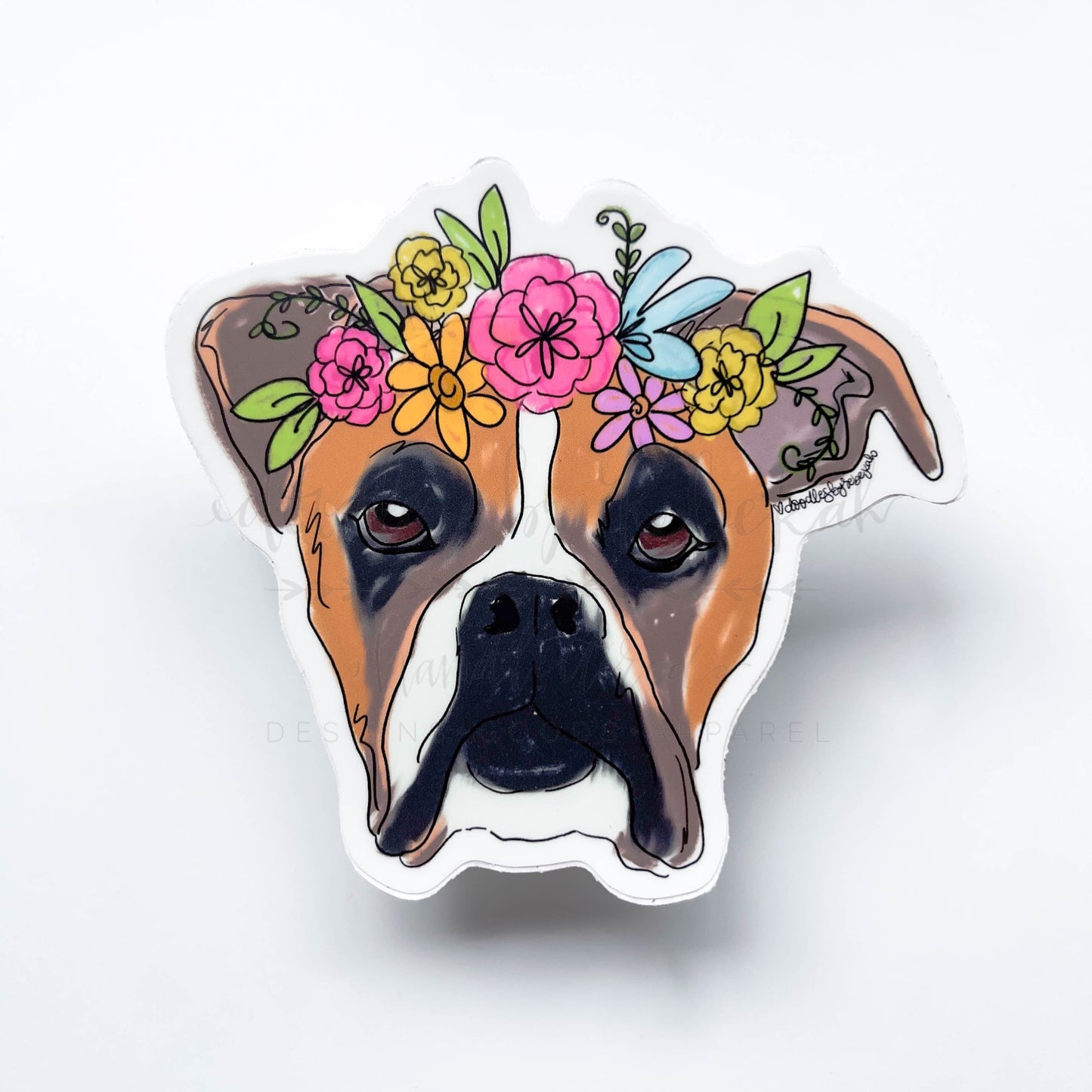A sticker depicting a colorful illustration of a dog's head with a floral crown made from various flowers.