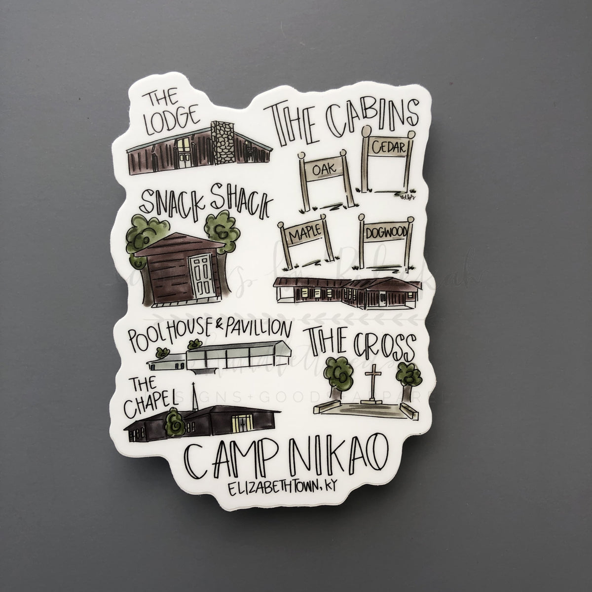 Die cut sticker with various buildings from Camp Nikao in Elizabethtown, KY in Rebekah's hand drawn style