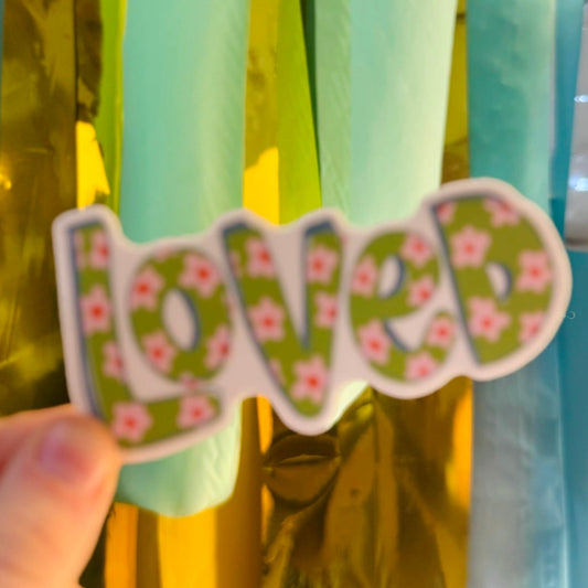 Doodles by Rebekah "Loved" whimsical floral vinyl sticker. This hand-painted sage green and pink botanical decal is a perfect inspirational gift for decorating water bottles, laptops, and mirrors.