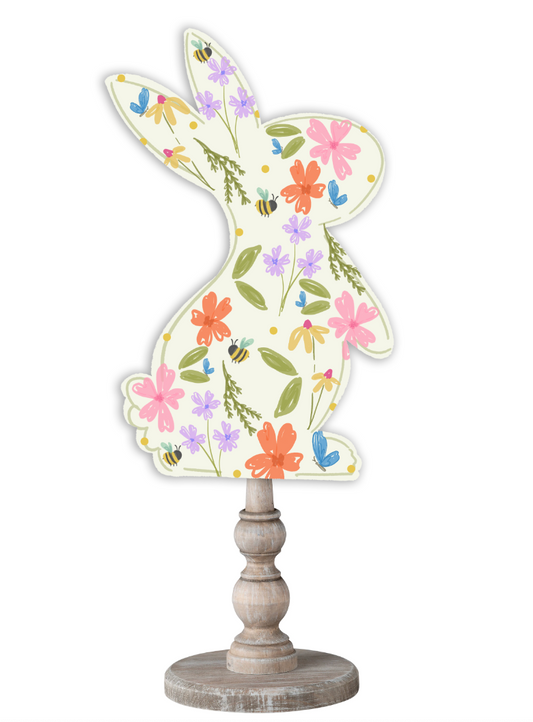 Doodles by Rebekah spring bunny decor featuring a whimsical floral and bumblebee pattern on a rustic turned wood stand.