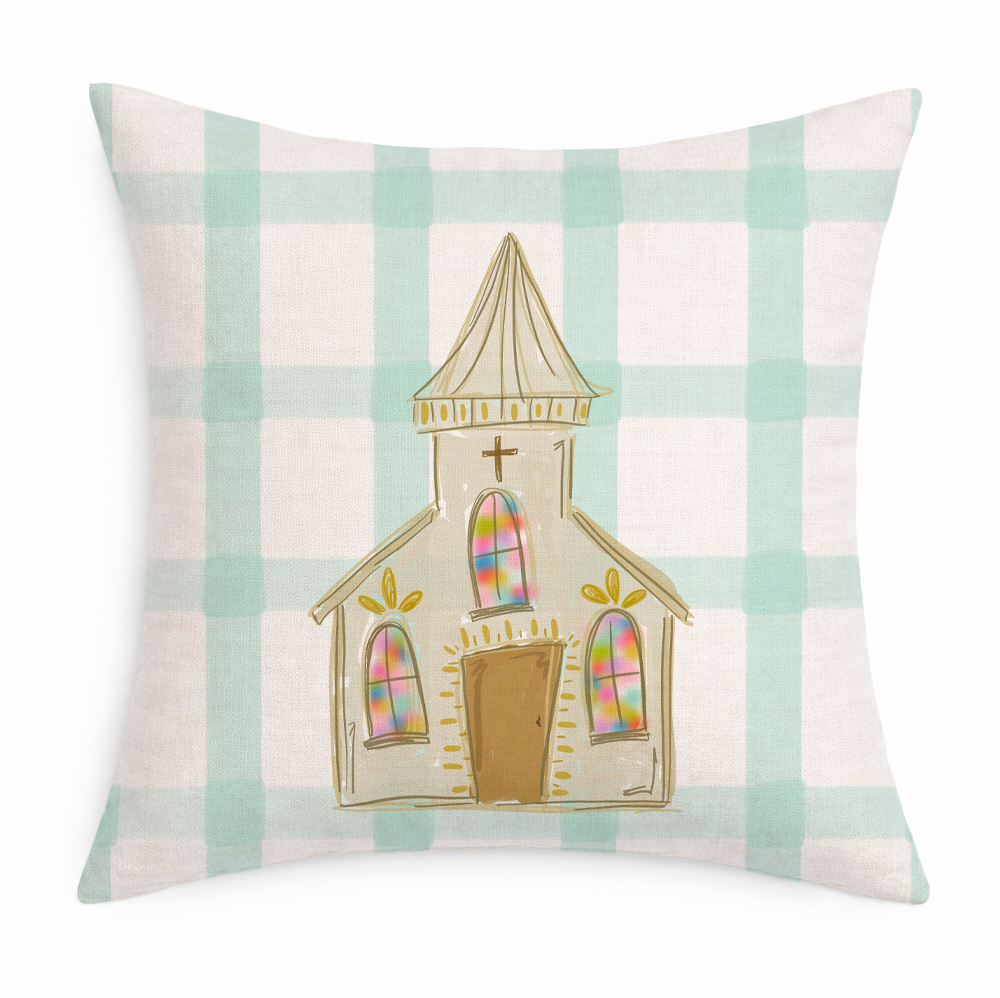 a blue and white gingham pillow with a hand drawn church on a white background