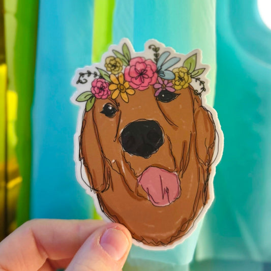 Doodles by Rebekah Golden Retriever flower crown vinyl sticker. This whimsical hand-painted dog breed decal is a perfect gift for Golden Retriever owners and dog lovers to decorate water bottles, laptops, and pet journals.
