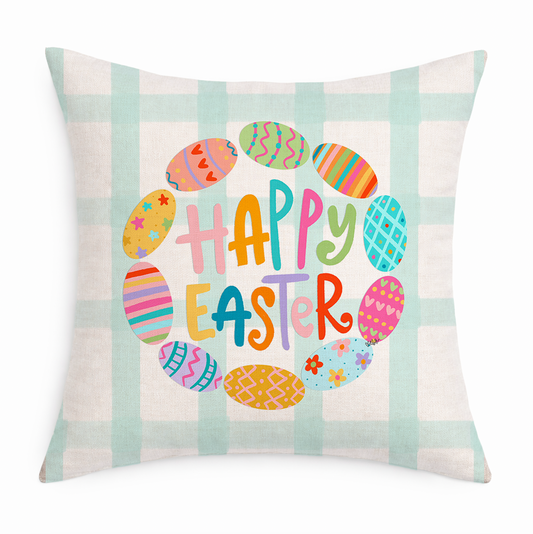 Decorative pillow with 'Happy Easter' text and colorful eggs on a plaid background