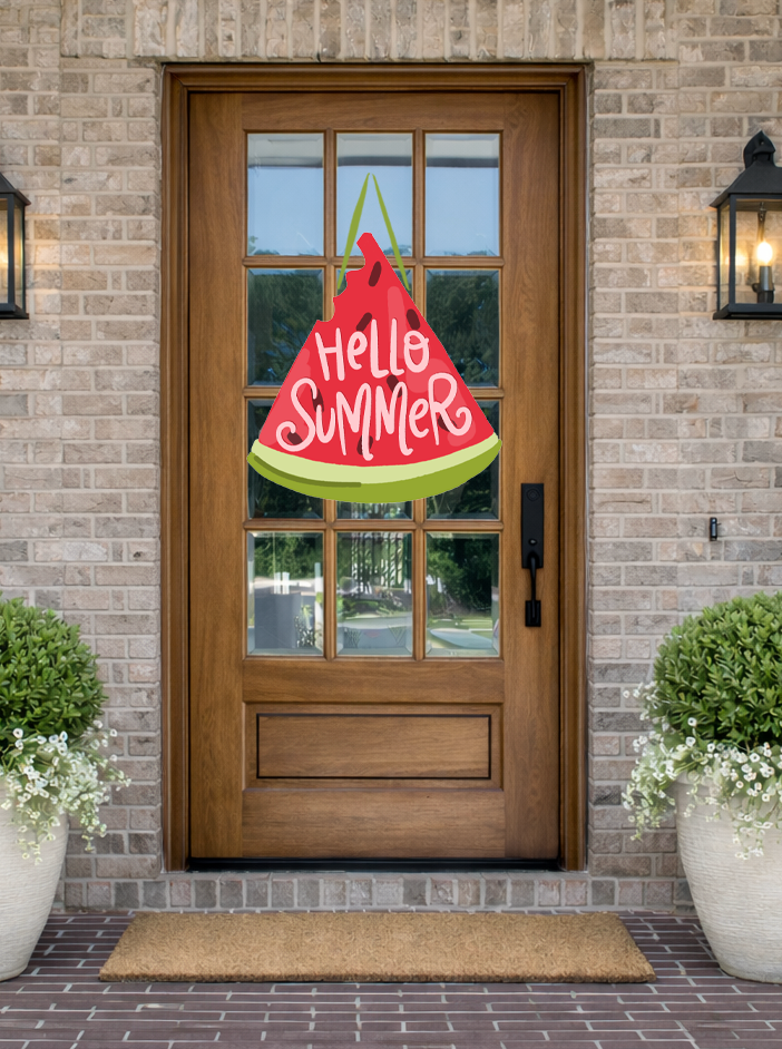 Doodles by Rebekah "Hello Summer" watermelon door decor featuring a whimsical hand-drawn fruit illustration on a rustic front porch.