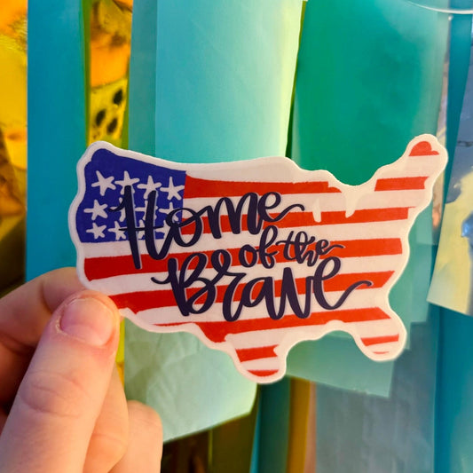 Doodles by Rebekah "Home of the Brave" patriotic USA map sticker. This whimsical hand-painted American flag vinyl decal is a perfect gift for veterans or for decorating water bottles, laptops, and travel journals.