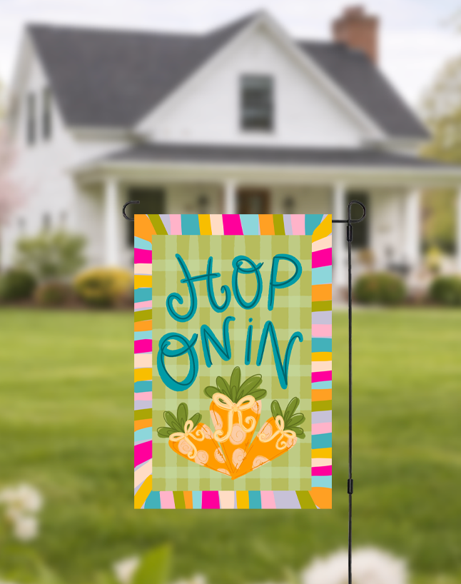 Doodles by Rebekah "Hop On In" Easter garden flag featuring whimsical hand-painted carrots and a green checkered pattern. This colorful spring outdoor decor, with its bright striped border, is perfect for welcoming guests to a front yard or garden during the Easter season.