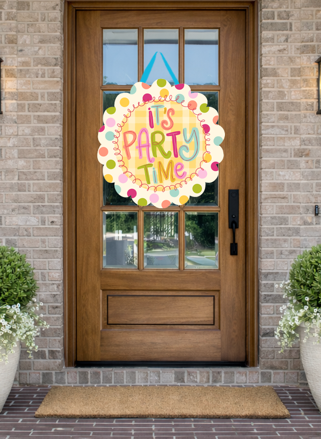 Doodles by Rebekah "It's Party Time" birthday door decor featuring a whimsical hand-drawn design and colorful polka dots on a rustic front porch.