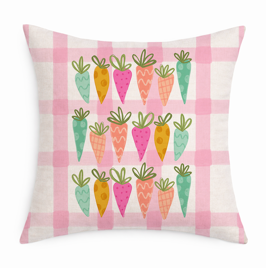 Decorative pillow with colorful carrot pattern on a pink and white checkered background