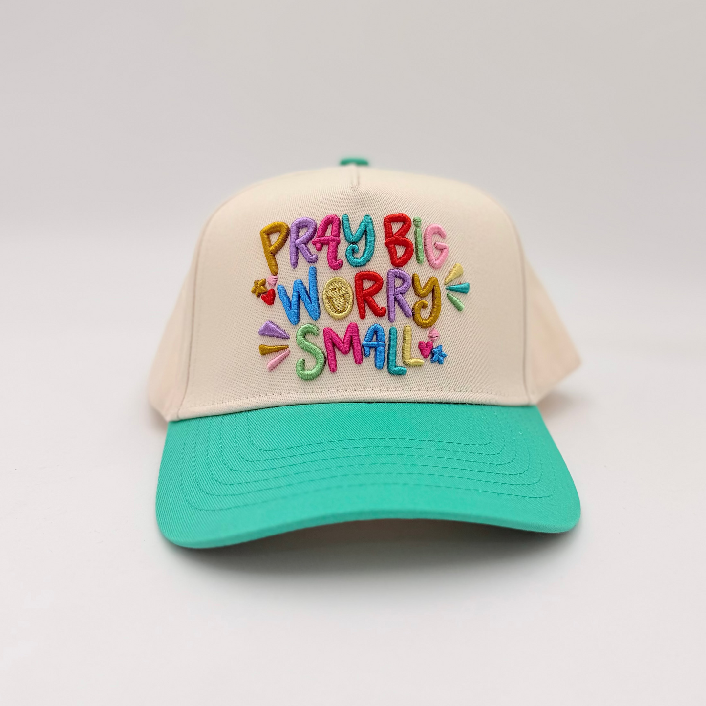 Pray Big Worry Small Embroidered Hat on a light gray background