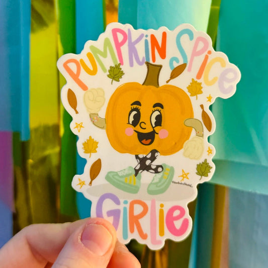 Doodles by Rebekah "Pumpkin Spice Girlie" autumn-themed vinyl sticker. This colorful hand-painted decal featuring a cute pumpkin character and falling leaves is a perfect seasonal gift for decorating water bottles, laptops, and planners during the fall.