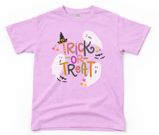 Lavender t-shirt with Halloween-themed design featuring ghosts and 'Trick or Treat' text on a white background.