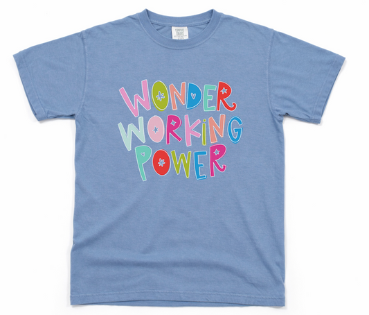 Blue t-shirt with colorful text 'Wonder Working Power' on a white background