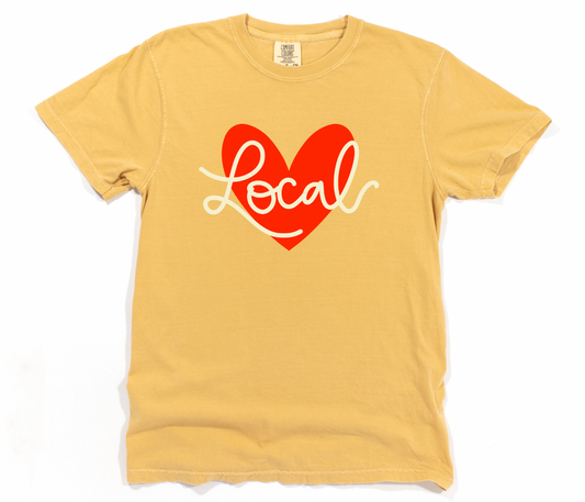Yellow t-shirt with a red heart and 'Local' text on a white background