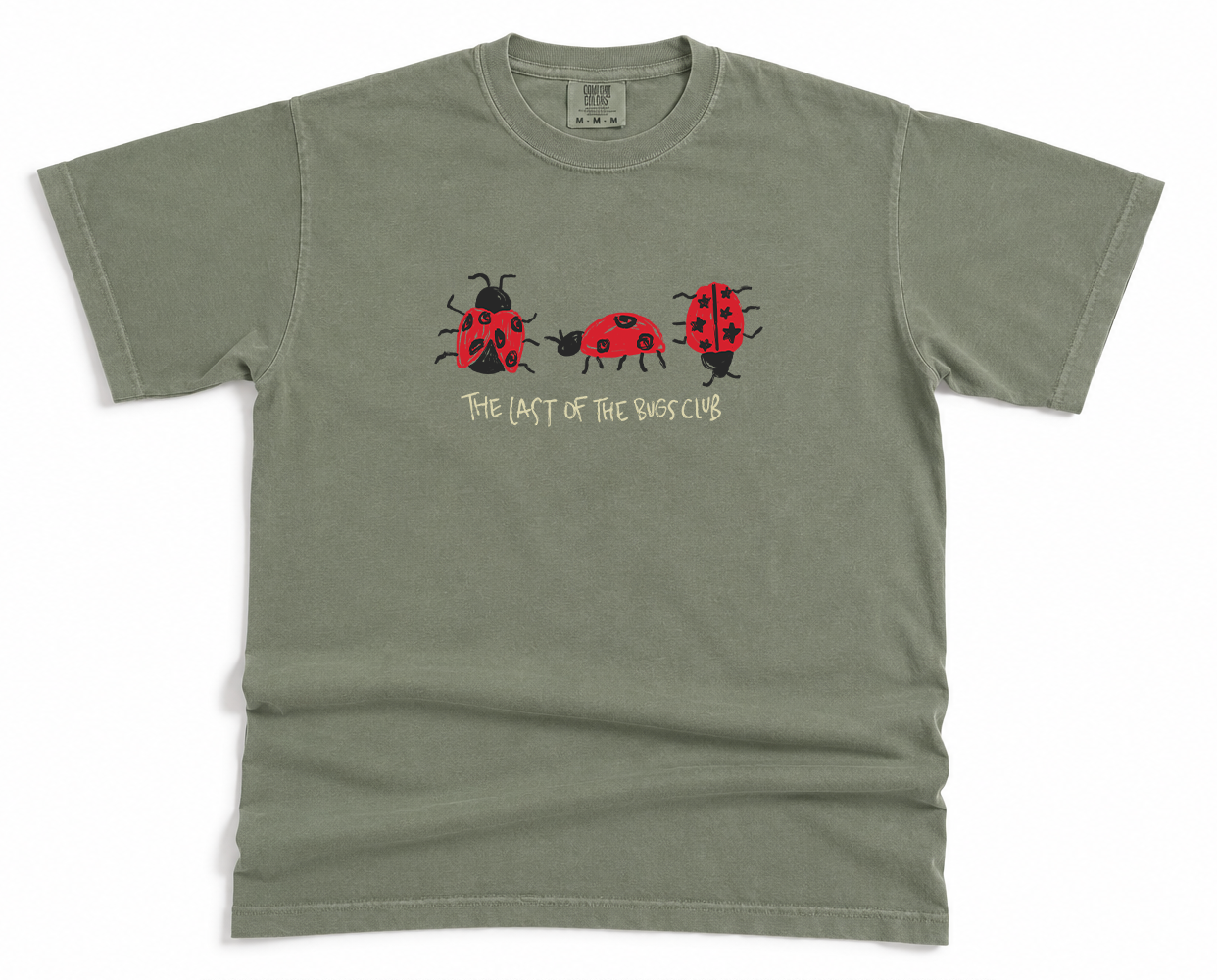 Green t-shirt with ladybug design and The Last of the bugs club text on a white background