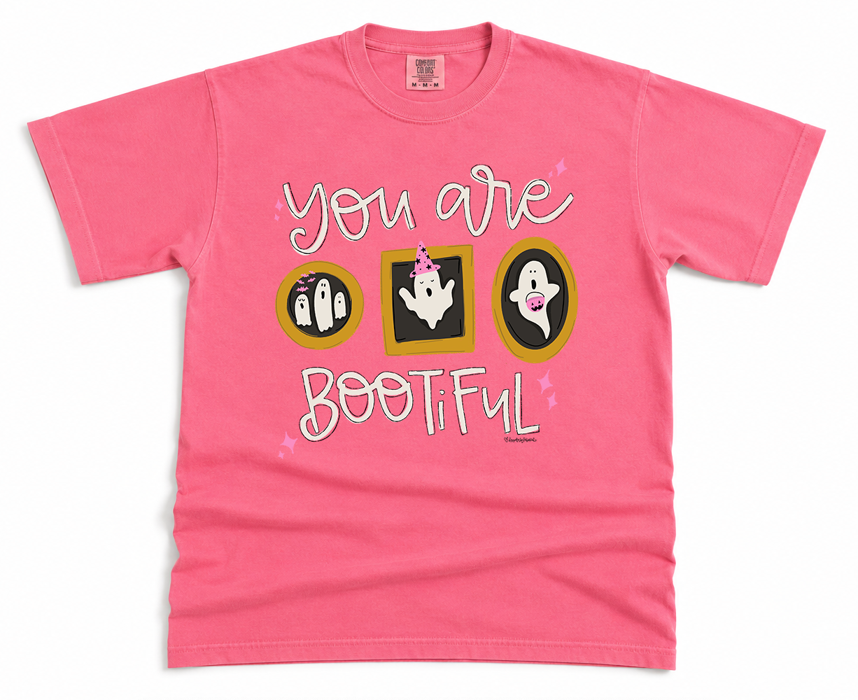 Pink t-shirt with 'You are Bootiful' text and ghost illustrations on a white background