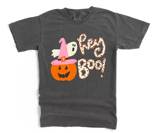 Gray t-shirt with Halloween-themed design featuring a pumpkin, ghost, and 'hey boo!' text on a white background.
