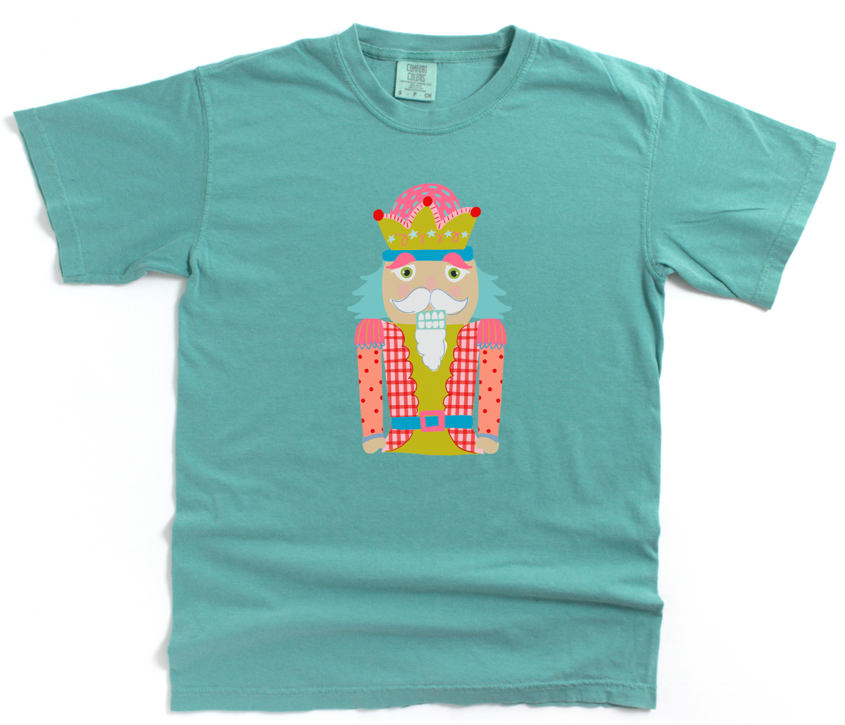 Teal t-shirt with a colorful graphic of a nutcracker on a white background