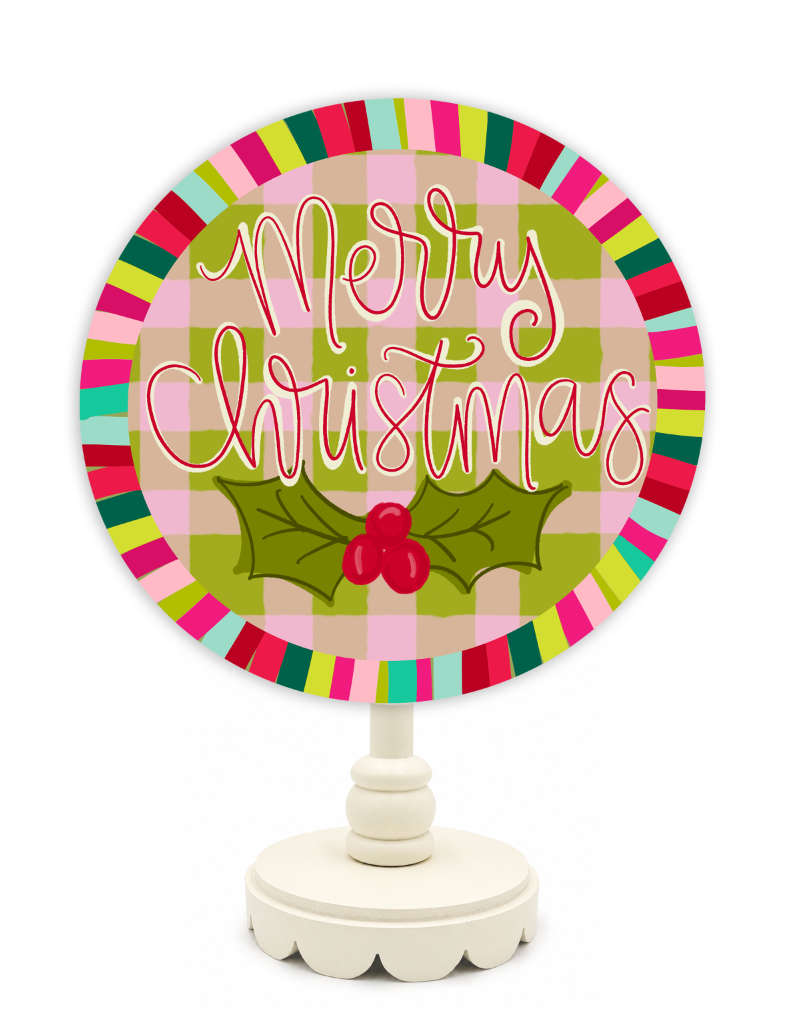 Decorative Christmas sign with 'Merry Christmas' text on a colorful plaid background.