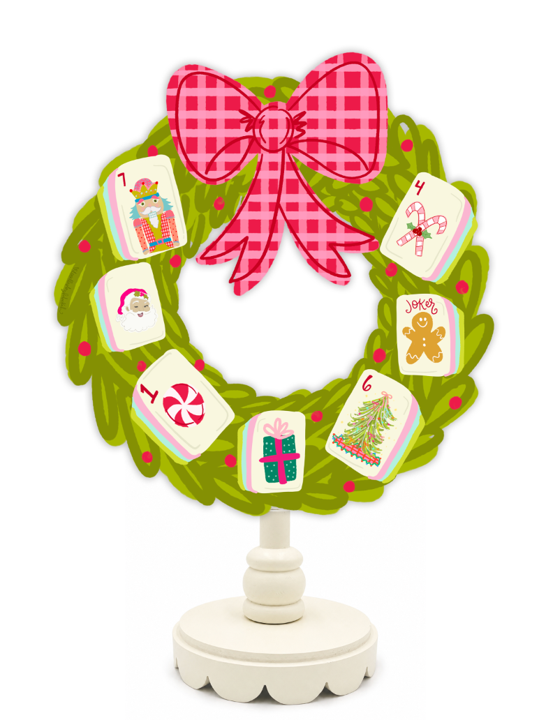 Decorative Christmas wreath with tiles and a pink bow on a white background