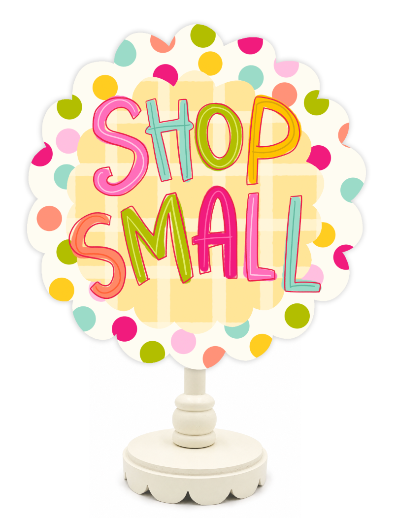 Decorative sign with 'Shop Small' text on a white background