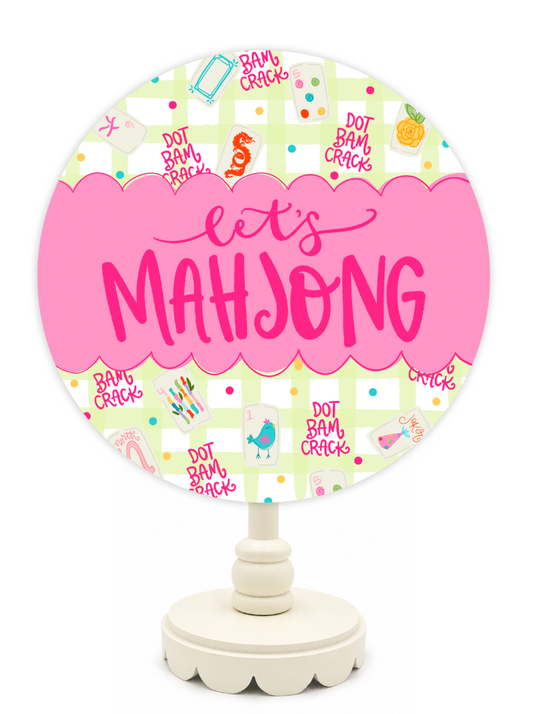 Decorative sign with 'let's Mahjong' text on a colorful background