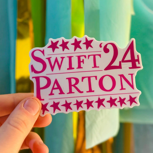 Doodles by Rebekah "Swift Parton '24" Taylor Swift and Dolly Parton campaign-style sticker. This pink whimsical vinyl decal is a perfect pop-culture gift for music fans to decorate water bottles, laptops, and planners.