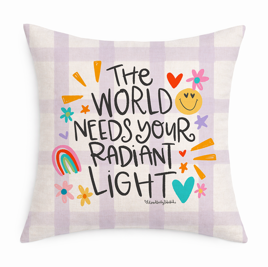 Decorative pillow with motivational quote and colorful graphics on a white background