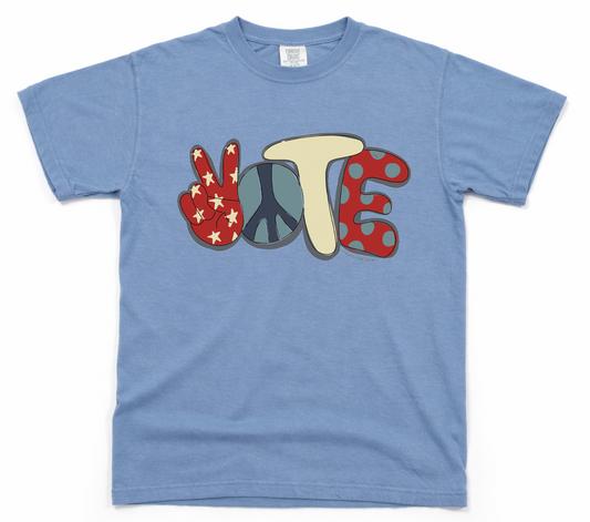 Blue t-shirt with colorful 'VOTE' design on a white background