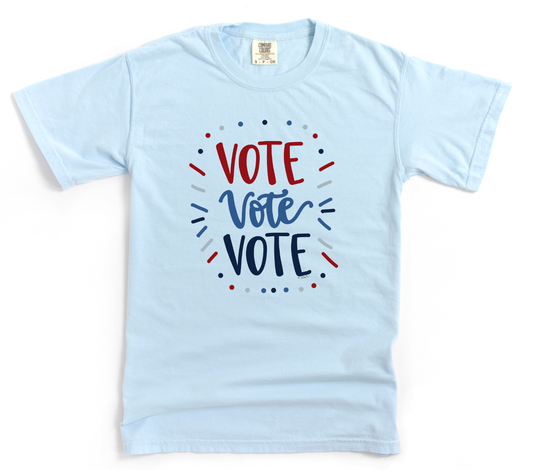 Light blue t-shirt with 'Vote Vote Vote' text on a white background