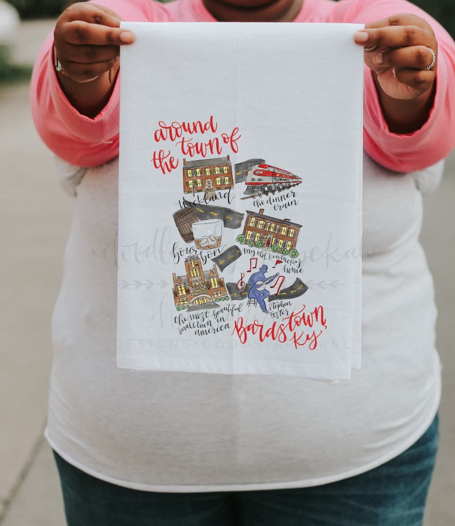 White tea towel with images of Bardstown, KY

