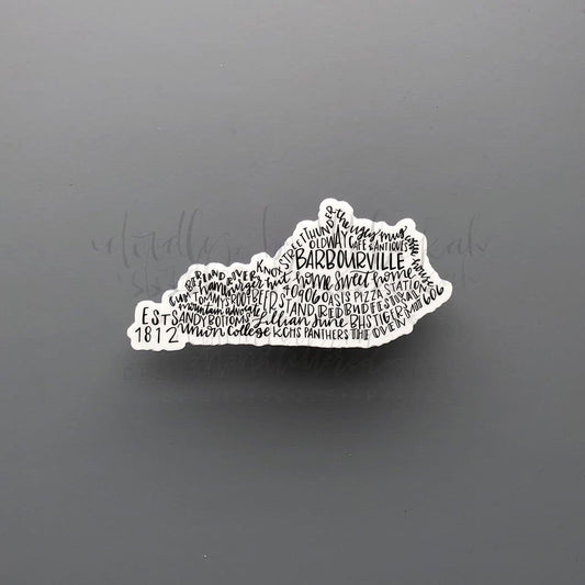 White and Black sticker with doodles of words describing Barbourville, KY