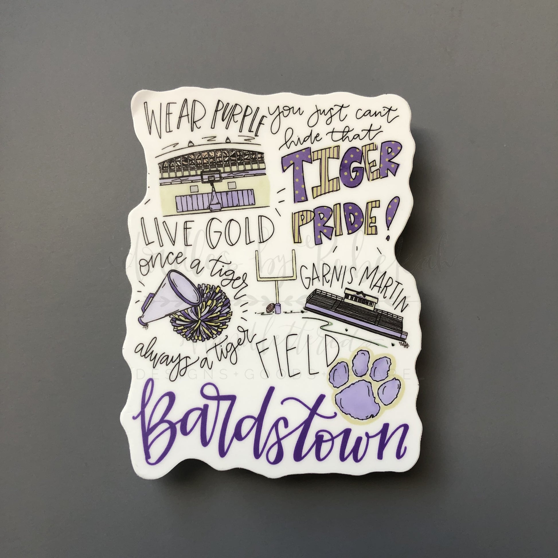 White sticker with purple and yellow design for Bardstown Tigers