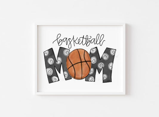An 8x10 framable print featuring the words 'BASKETBALL MOM' in a whimsical font, surrounded by a graphic of a basketball and swirl designs.
