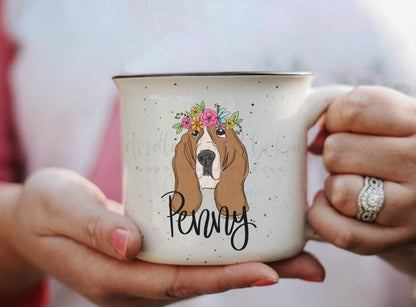 Woman holding a coffee mug with an image of basset hound named Penny