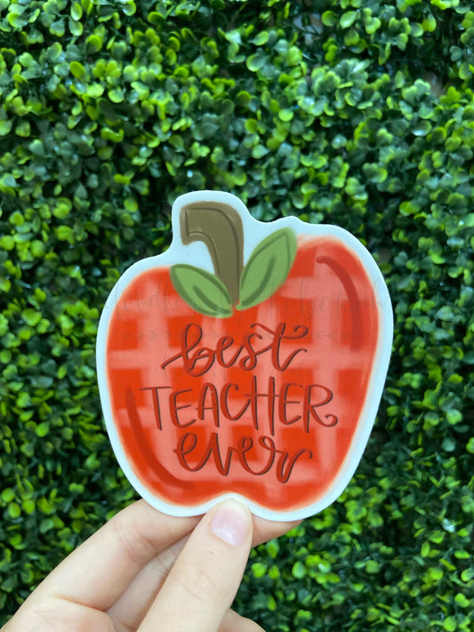 Best Teacher Ever sticker featuring a whimsical red apple illustration with a plaid pattern and cursive typography.