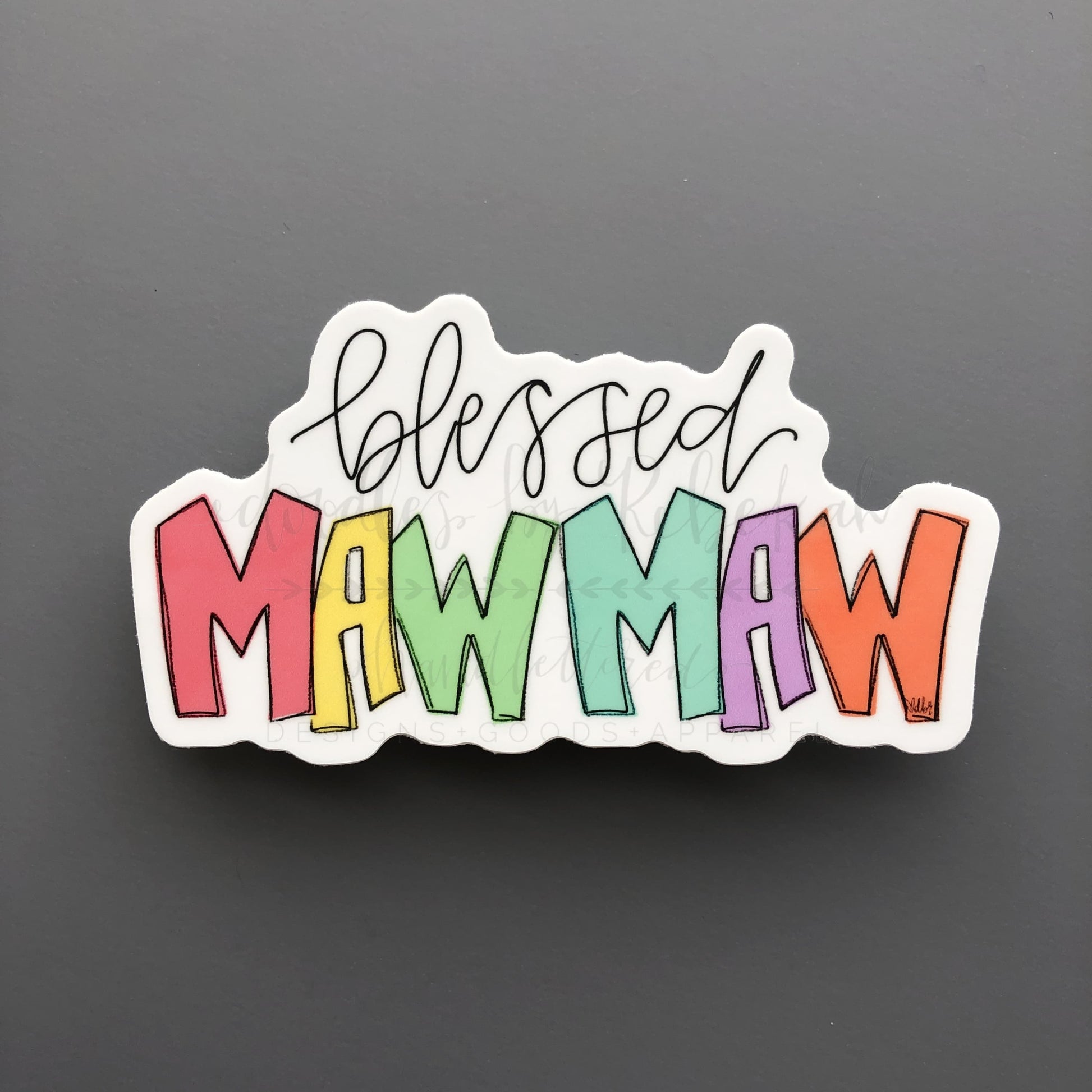 A colorful sticker with the text 'Blessed Mawmaw' in a playful, handwritten-style font on a white background.
