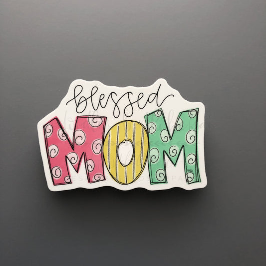 Colorful sticker that reads "Blessed Mom" in Rebekah's handwriting 